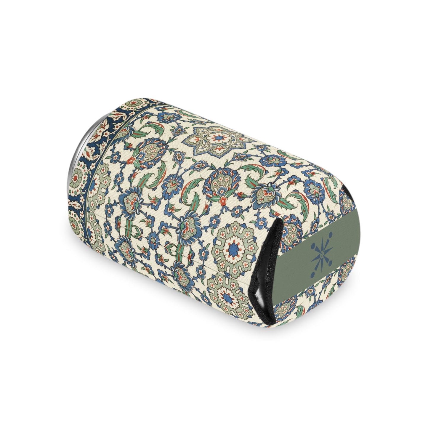 A can cooler with a geometric floral pattern in shades of dark blue and beige with splashes of dark orange. The can is lying on its side with the bottom of the cooler facing the camera.