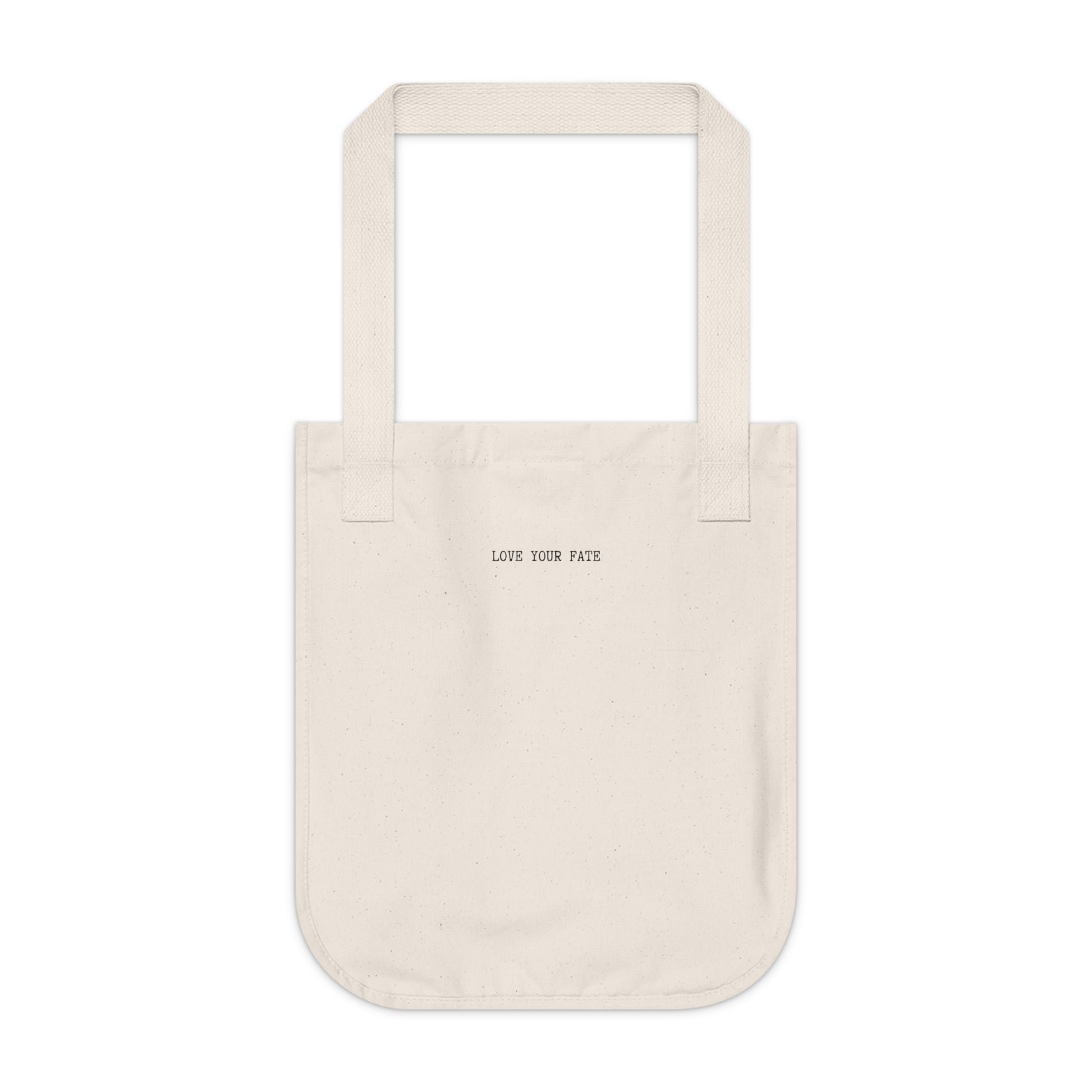 Natural canvas tote bag, back view, with the words "LOVE YOUR FATE" printed in small, black, typewriter-style text across the center.