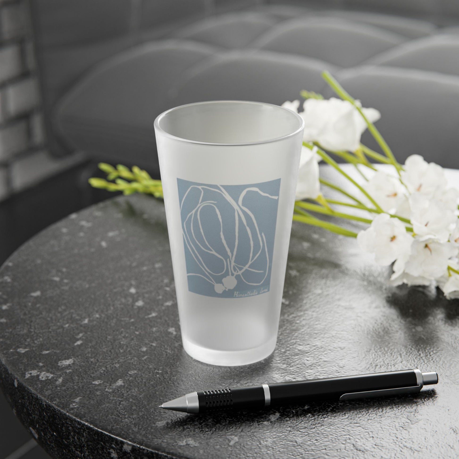Frosted pint glass featuring Anna Atkins' cyanotype of Himanthalia Lorea from the Sumac and Pine Blueprints from the Sea collection