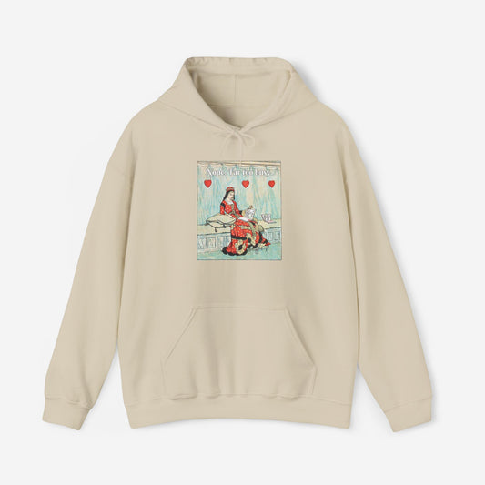 A beige hoodie with a vintage illustration of the Queen of Hearts lounging on a bench reading The Art of Making Tarts. Above her the text reads "Nope. Far too busy."