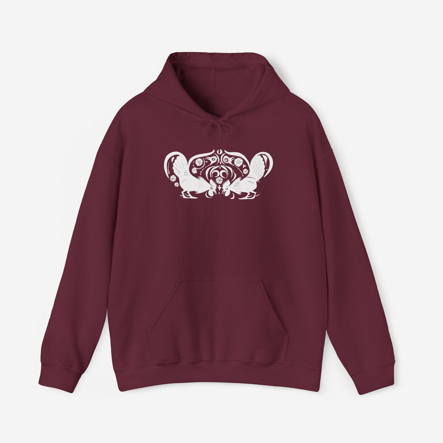 A maroon hoodie with a white, art noveau style print of two roosters crouching face-to-face. The roosters are mirror images of each other and a symmetrical pattern arches between them.