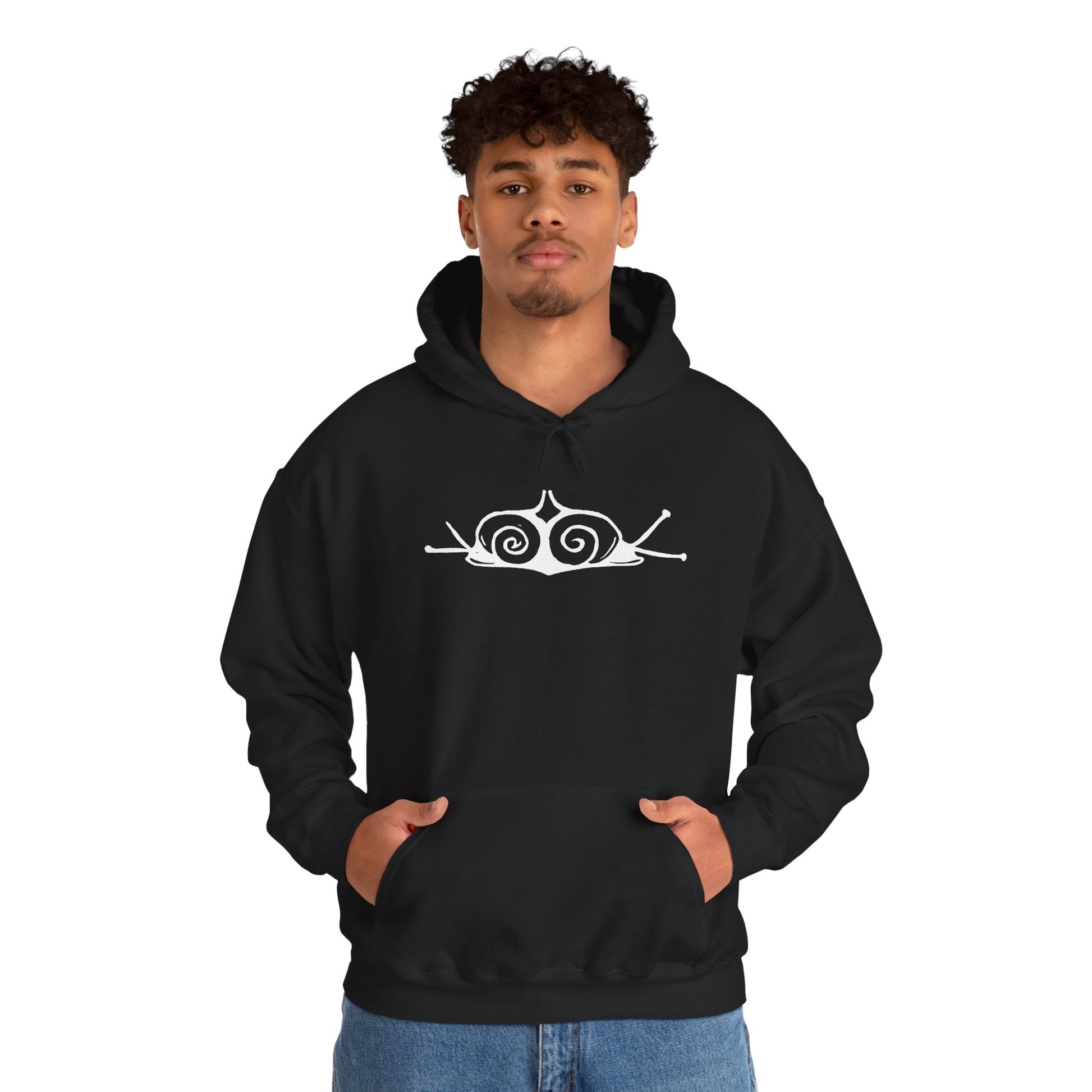 A man wears a black hoodie with a white, art noveau style print of two snails facing away from each other. The snails are mirror images of each other and slightly overlap in the middle of the design.