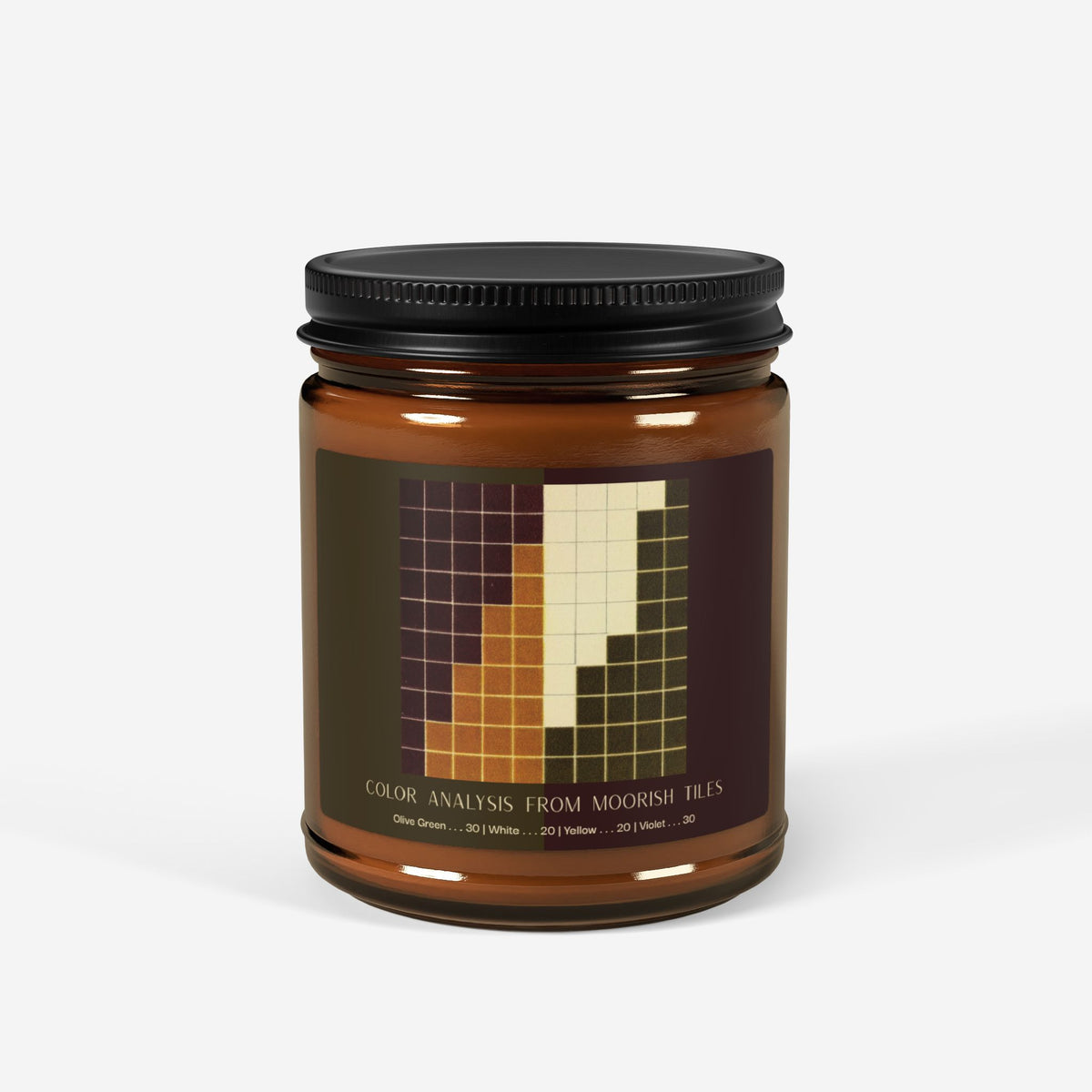 Amber glass candle jar with a black lid and a label showing a ten-by-ten grid of violet, golden yellow, cream, and olive green squares, titled Color Analysis from Moorish Tiles.