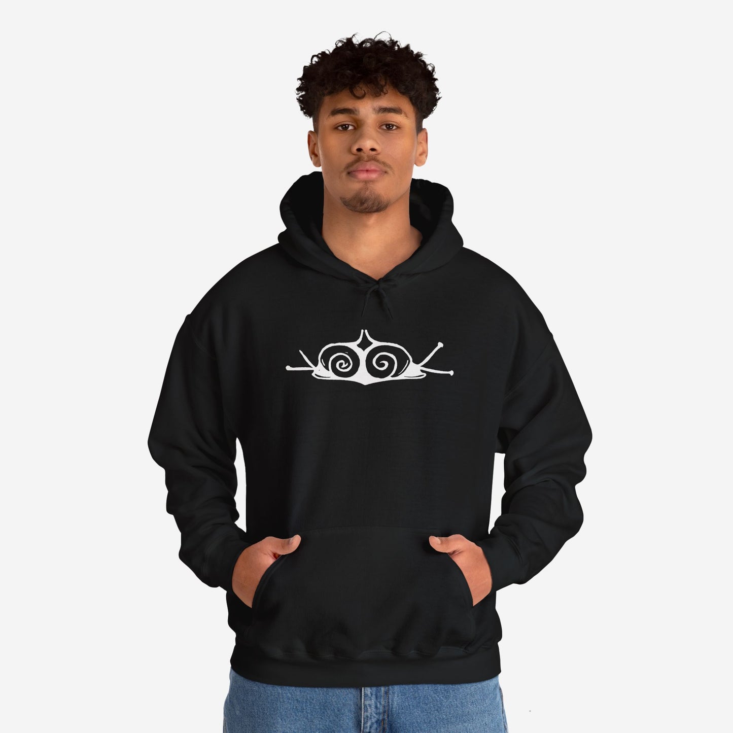 A man wears a black hoodie with a white, art noveau style print of two snails facing away from each other. The snails are mirror images of each other and slightly overlap in the middle of the design.